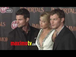 Claire Holt at IMMORTALS World Premiere Red Carpet Arrivals